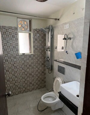 Bathroom in 2 BHK Apartment at Meenal Balmukund Residency, Raj Nagar Extension – for Sale