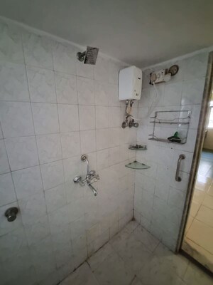 Bathroom in 1 BHK Apartment at Vijay Garden, Ghodbunder Road – for Rent