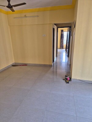 Living Room in 2 BHK Apartment at Runwal Garden City, Balkum Pada – for Rent