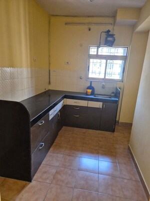 Kitchen in 2 BHK Apartment at Runwal Garden City, Balkum Pada – for Rent