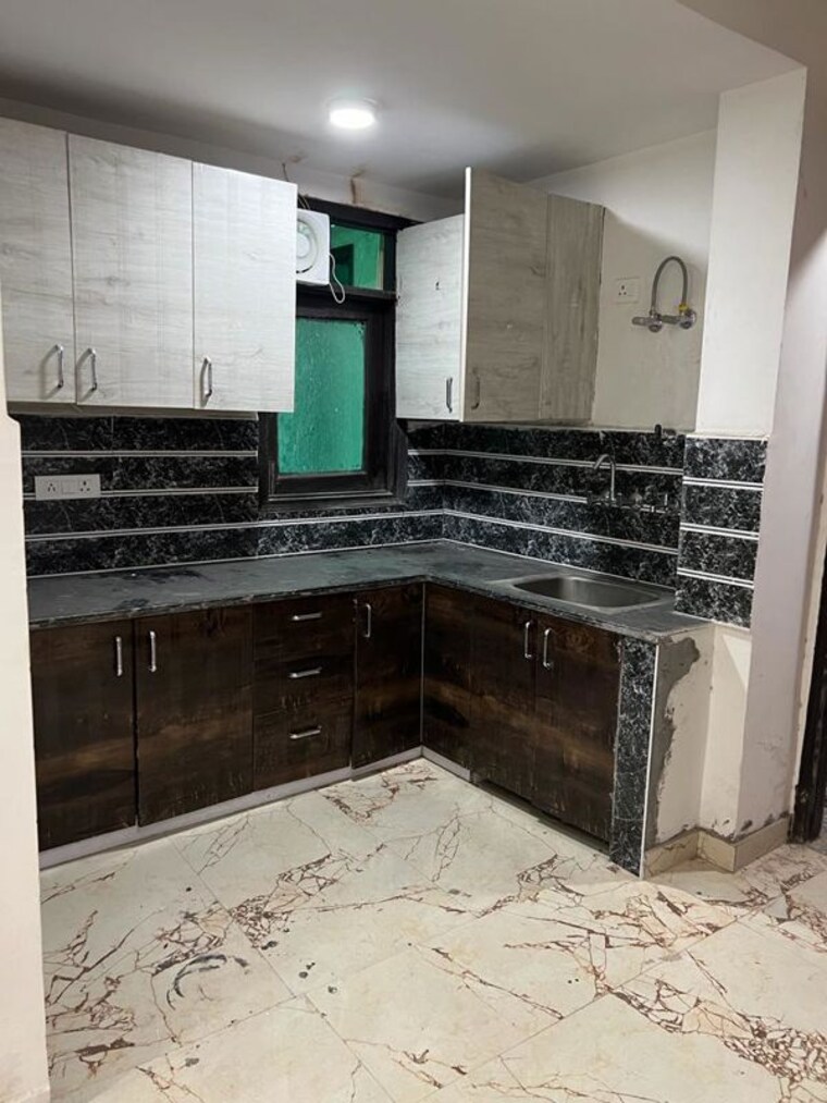 Kitchen, freedom fighters enclave 2 Bedroom 850 Sq.Ft. Apartment In Freedom Fighters Enclave Delhi 10260993