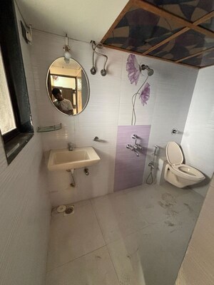 Bathroom in 2 BHK Apartment at Accord CHS Andheri West, Andheri West – for Rent