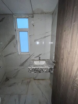 Bathroom in 2.5 BHK Builder Floor at Smart World Gems, Sector 89 – for Sale