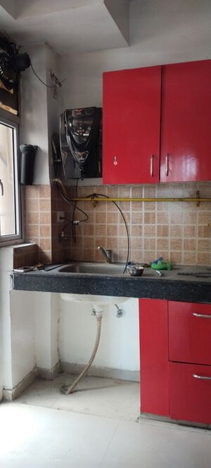 Kitchen in  Apartment at Mahagun My Woods, Sector 16c Greater Noida – for Rent