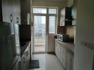 Kitchen in 4 BHK Builder Floor at Emaar Emerald Estate, Sector 65 – for Rent