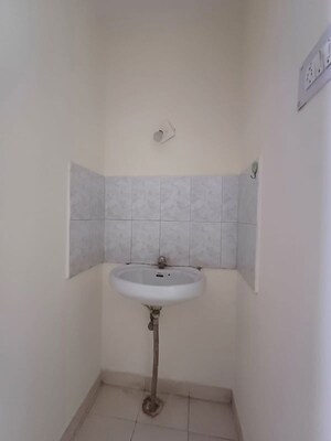 Bathroom in 2 BHK Apartment at Patil Raghukul Nagari CHS, Bopodi – for Rent