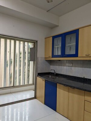Kitchen in 3 BHK Apartment at Subhangan Apartment, Santacruz West – for Sale