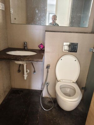 Bathroom in 3 BHK Apartment at Nabar Shankar Heights, Aundh – for Rent