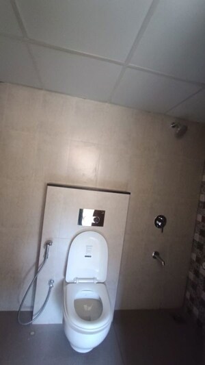 Bathroom in 3 BHK Apartment at Shapoorji Pallonji Vanaha Golfland, Bavdhan – for Rent