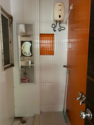 Bathroom in 2 BHK Apartment at Evershine Mars CHS, Kandivali East – for Rent