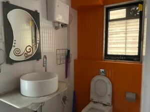 Bathroom in 2 BHK Apartment at Evershine Mars CHS, Kandivali East – for Rent