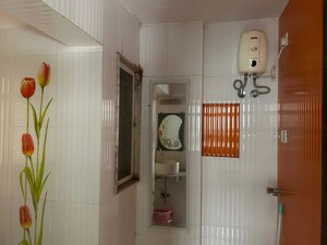 Bathroom in 2 BHK Apartment at Evershine Mars CHS, Kandivali East – for Rent