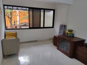 Living Room in 1 BHK Apartment at Lokpuram CHS, Vasant Vihar – for Rent