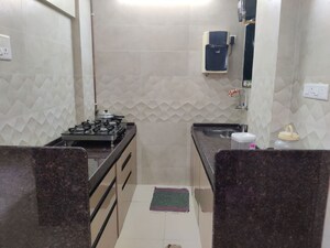 Kitchen in 1 BHK Apartment at Lokpuram CHS, Vasant Vihar – for Rent