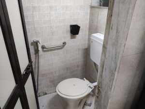 Bathroom in 1 BHK Apartment at Lokpuram CHS, Vasant Vihar – for Rent