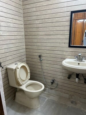 Bathroom in 4 BHK Apartment at Panchsheel Enclave – for Rent