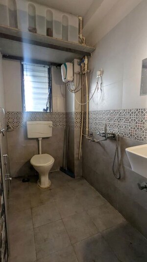 Bathroom in 1 BHK Apartment at Sanghvi Chandan Pride, Ghatkopar East – for Rent