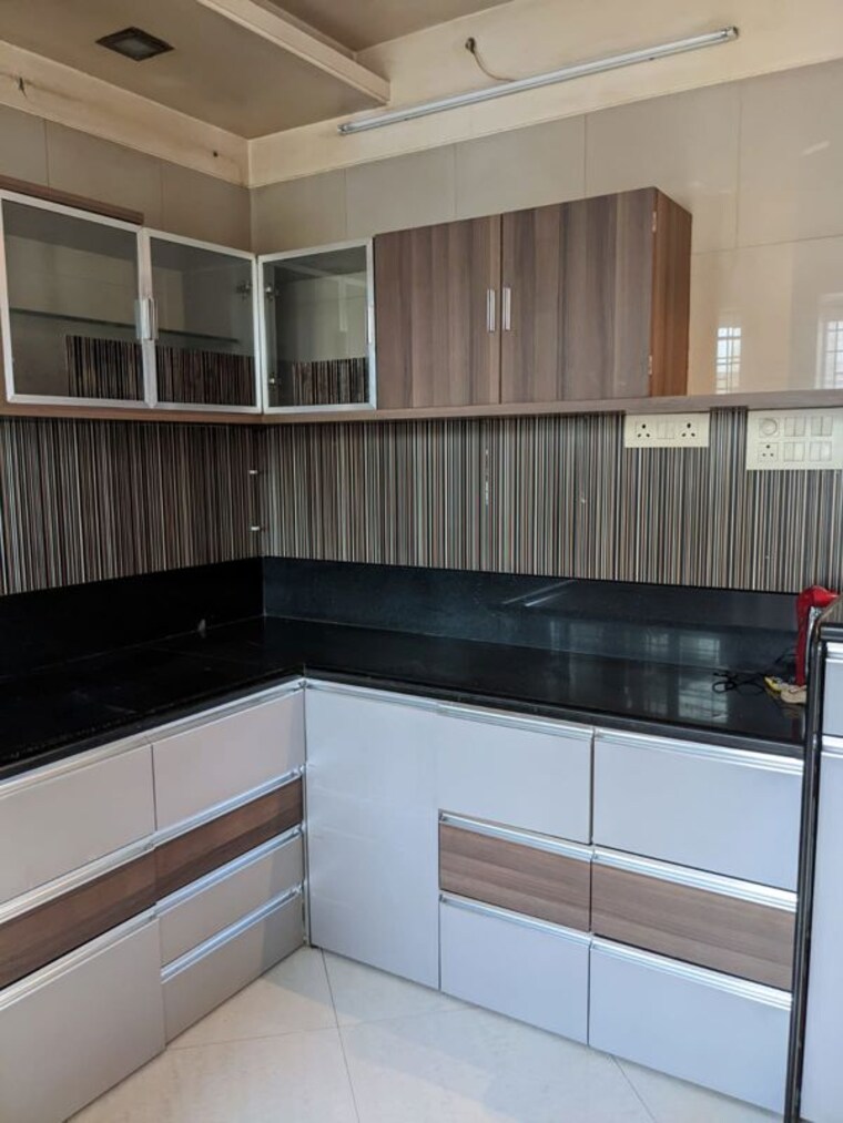 Kitchen, rama-capriccio-phase-i 4 Bedroom 1800 Sq.Ft. Penthouse In Wakad Pune 10262618