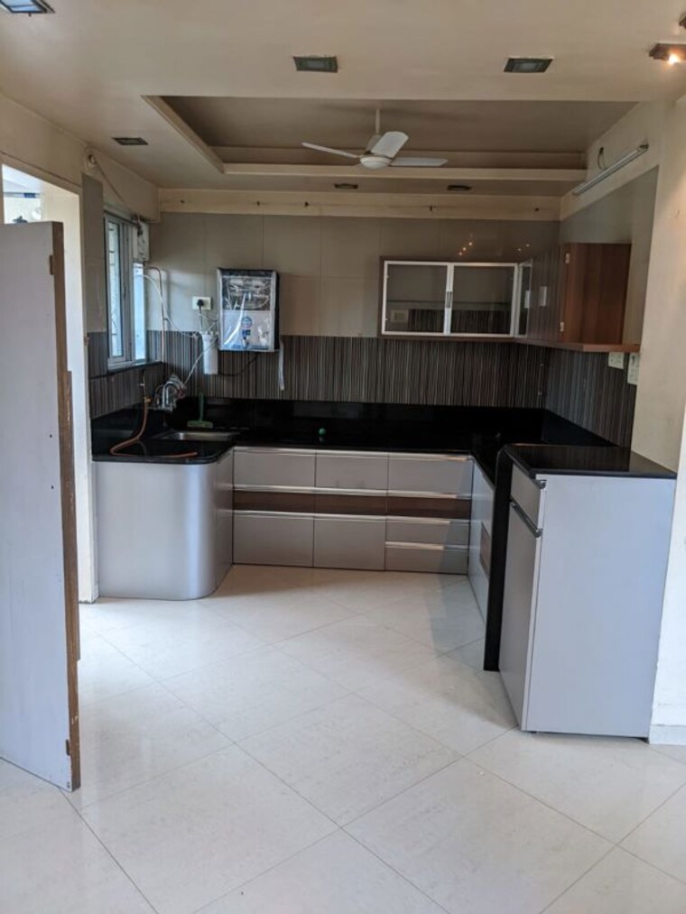 Kitchen, rama-capriccio-phase-i 4 Bedroom 1800 Sq.Ft. Penthouse In Wakad Pune 10262618
