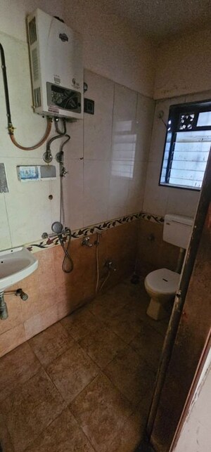 Bathroom in 2 BHK Apartment at Ahuja Karma Kastle, Chembur – for Rent