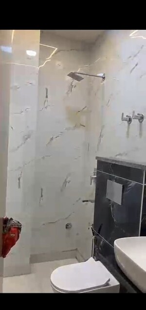 Bathroom in 3 BHK Builder Floor at Raghu Nagar – for Sale