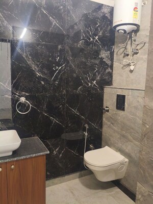 Bathroom in 3 BHK Builder Floor at RWA Surya Vihar, Sector 21 – for Rent