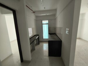 Kitchen in 1 BHK Apartment at Sushanku Avenue 36, Goregaon West – for Rent