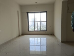 Room in 2 BHK Apartment at Chirag Vijayi Jwala, Goregaon West – for Sale
