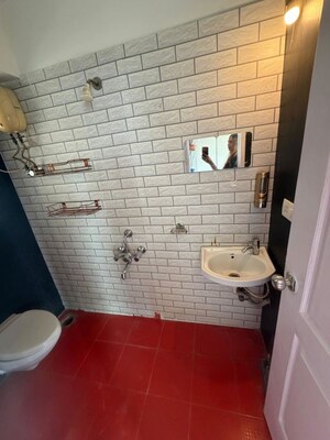 Bathroom in 2 BHK Apartment at Ratnakar CHS, Andheri West – for Sale