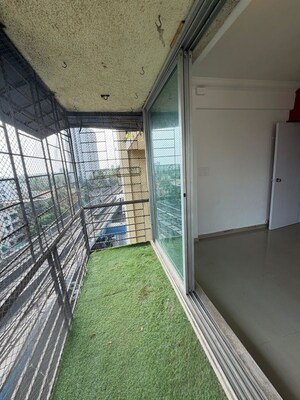 Balcony in 2 BHK Apartment at Ratnakar CHS, Andheri West – for Sale