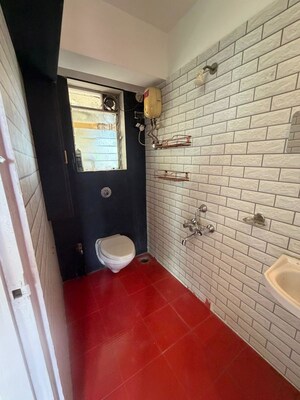 Bathroom in 2 BHK Apartment at Ratnakar CHS, Andheri West – for Sale