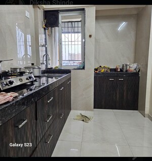 Kitchen in 2 BHK Apartment at Dosti Group Imperia, Manpada – for Rent