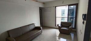 Living Room in 2 BHK Apartment at New Ambivali, Andheri West – for Rent