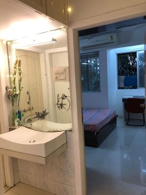 Master Bedroom in 1 BHK Apartment at Swajan CHS, Andheri West – for Rent