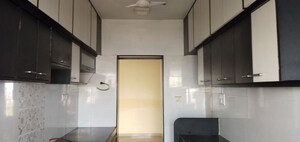 Kitchen in 2 BHK Apartment at Sheth Vasant Pride, Kandivali East – for Rent