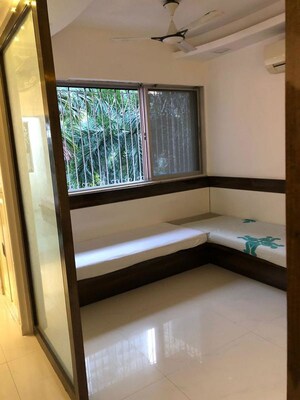 Bedroom in 1 BHK Apartment at Swajan CHS, Andheri West – for Sale