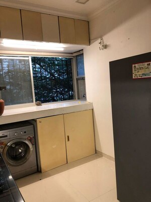 Kitchen in 1 BHK Apartment at Swajan CHS, Andheri West – for Sale