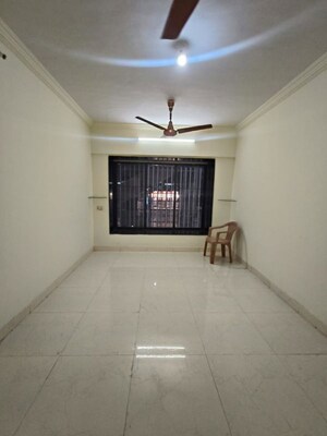 Living Room in 2 BHK Apartment at Koyna CHS Goregaon, Goregaon East – for Rent