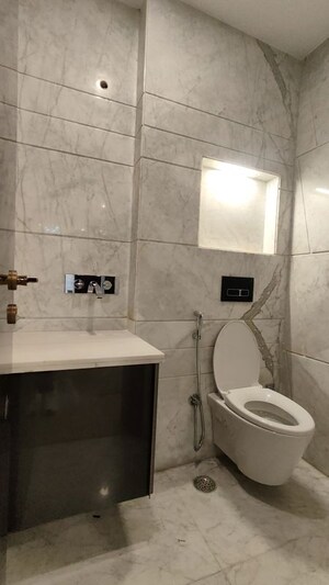 Bathroom in 4 BHK Builder Floor at Green Wood City, Sector 45 – for Sale