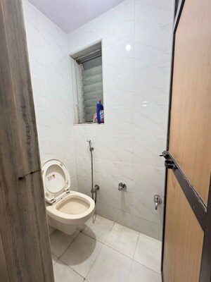 Bathroom in 1 BHK Apartment at Champak Apartment 59, Vasant Vihar – for Rent