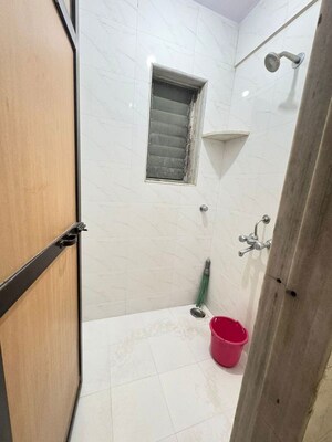 Bathroom in 1 BHK Apartment at Champak Apartment 59, Vasant Vihar – for Rent