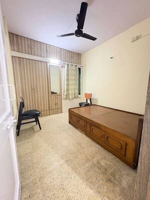 Bedroom in 1 BHK Apartment at Champak Apartment 59, Vasant Vihar – for Rent