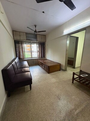 Living Room in 1 BHK Apartment at Champak Apartment 59, Vasant Vihar – for Rent