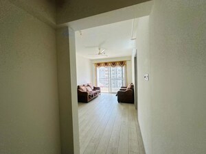 Living Room in 3 BHK Apartment at Unique K Shire, Punawale – for Rent