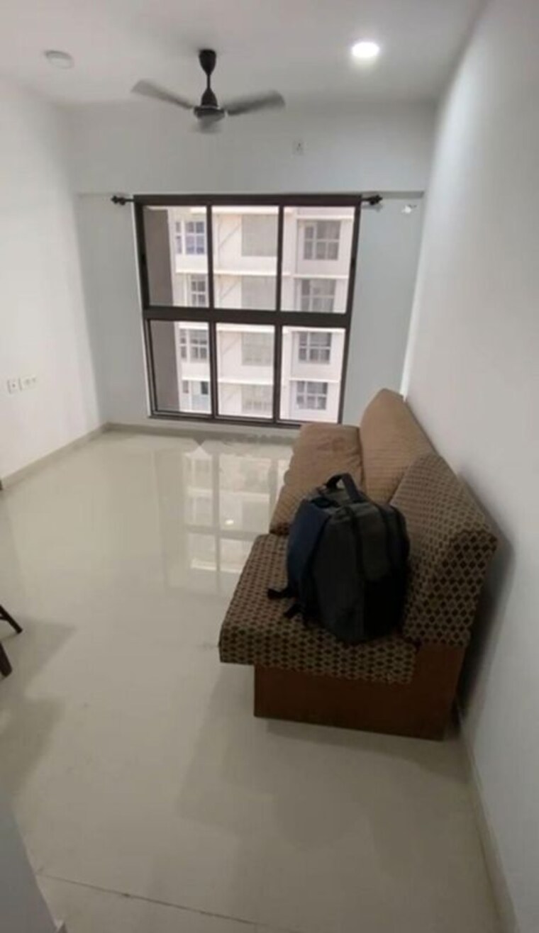 Living Room, uk-iridium 1 Bedroom 678 Sq.Ft. Apartment In Kandivali East Mumbai 10263463