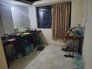 Living Room in 1 BHK Apartment at Ganga CHS Dapodi, Dapodi – for Rent