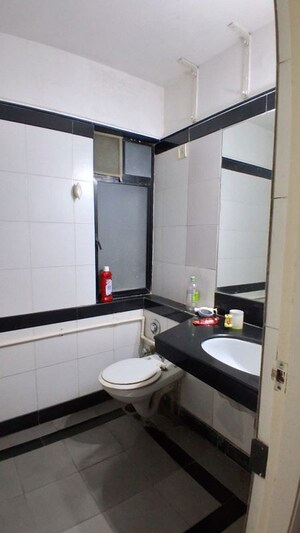 Bathroom in 3 BHK Apartment at Shikhar Kunj Malad, Malad East – for Rent