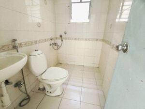 Bathroom in 2 BHK Apartment at Runwal Seagull, Hadapsar – for Rent