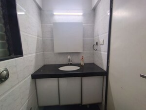 Bathroom in 2 BHK Apartment at Raunak Sai Dham Towers, Kandivali West – for Rent