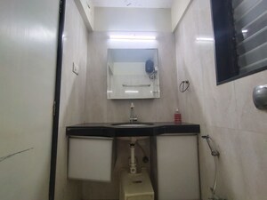 Attached Bathroom in 2 BHK Apartment at Raunak Sai Dham Towers, Kandivali West – for Rent